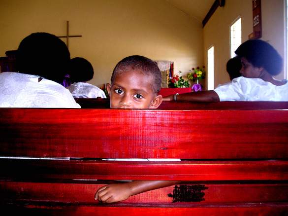 Girl in a church in Fiji 