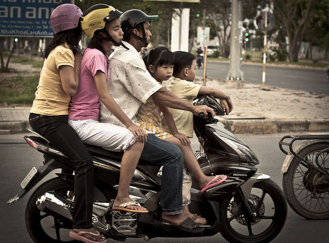 Locals riding motorbikes